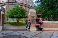 baduffy-260426-Tea's Grad Pics-6990-leaning on arch