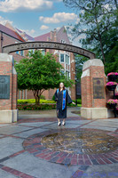 baduffy-260426-Tea's Grad Pics-6987-gown and sash FB arch